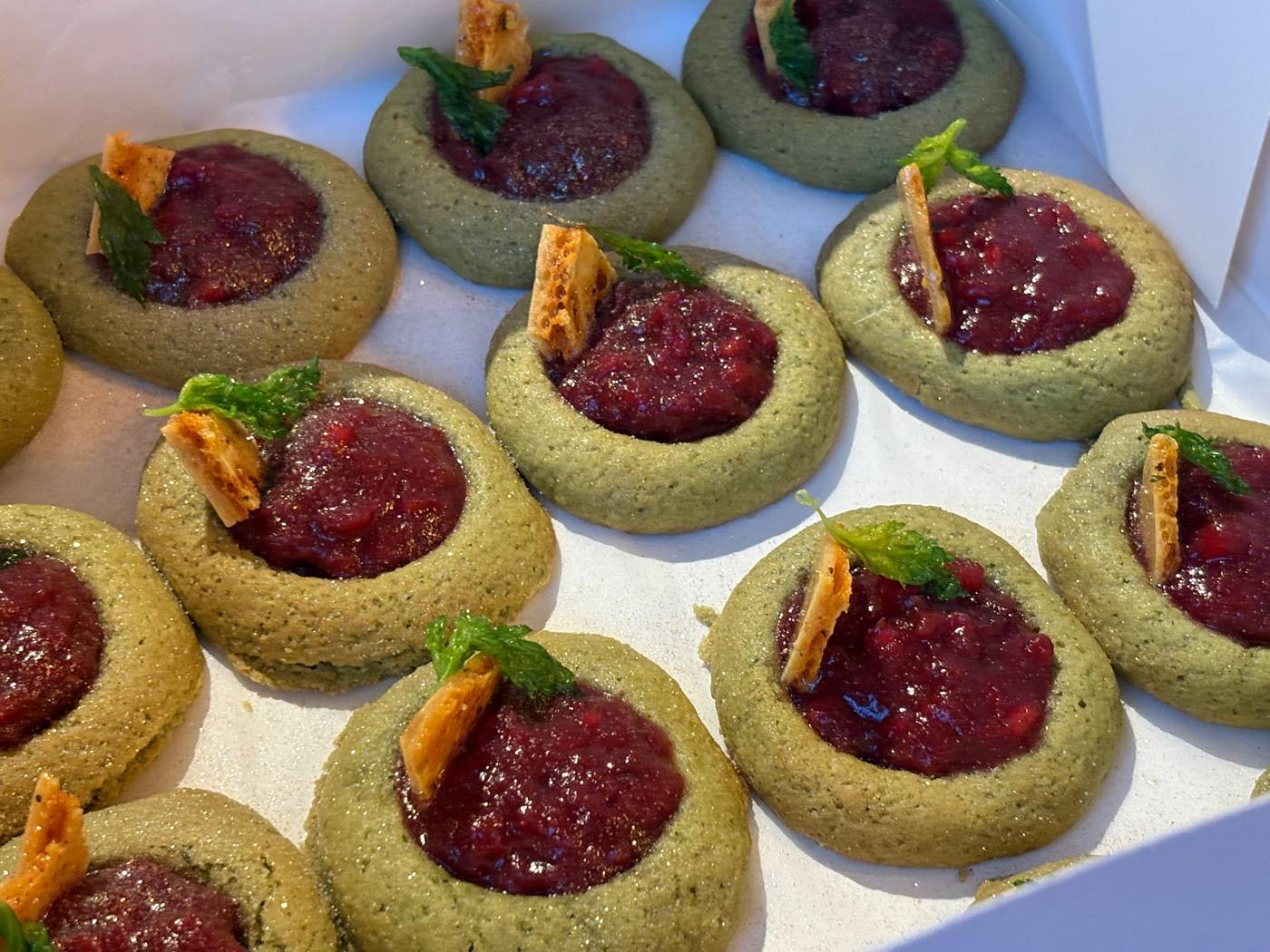 Herb-crusted bites with purple topping