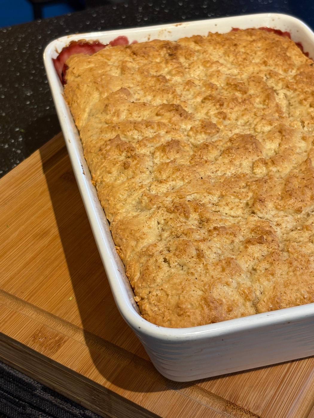 Golden coconut bake in a white dish